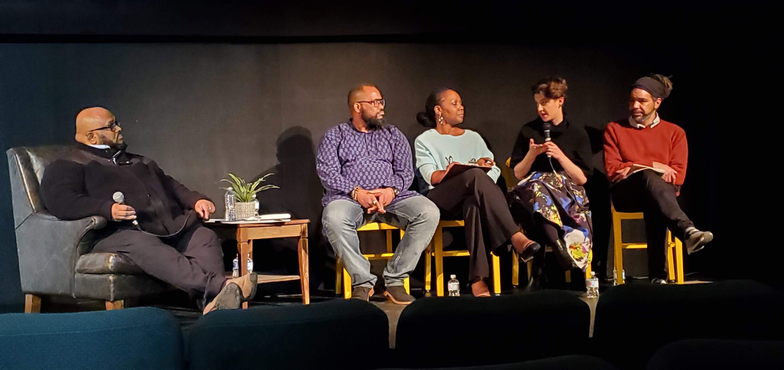 Image of panel discussion following a screen of "The Feminist on Cellblock Y". Moderated by Jeff Perera (White Ribbon Campaign), Brandon Hay (Founder of the Black Daddies Club (BDC), Abi Ajibolade – Executive Director The Redwood), Emma Lacey-Bordeaux (Producer of The Feminist on Cellblock Y), Julian Diego – Program coordinator at SKETCH